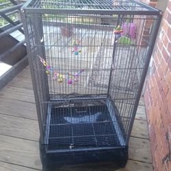 Bird Cage With Toys . With Wheels