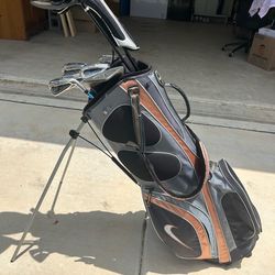 Fill set of Golf clubs: 2 drivers (mactec & strata) , Taylormade putter, & Di11 Wilson irons