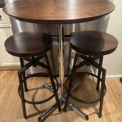 Bar Table & 2 Adjustable Stools.