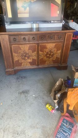 Antique cabinet and 47” tv