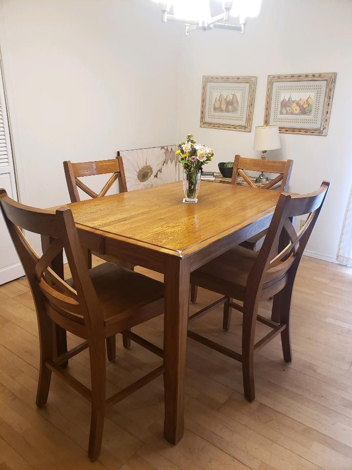 Bar height dining table with flip out leaf and 4 stools for Sale in ...