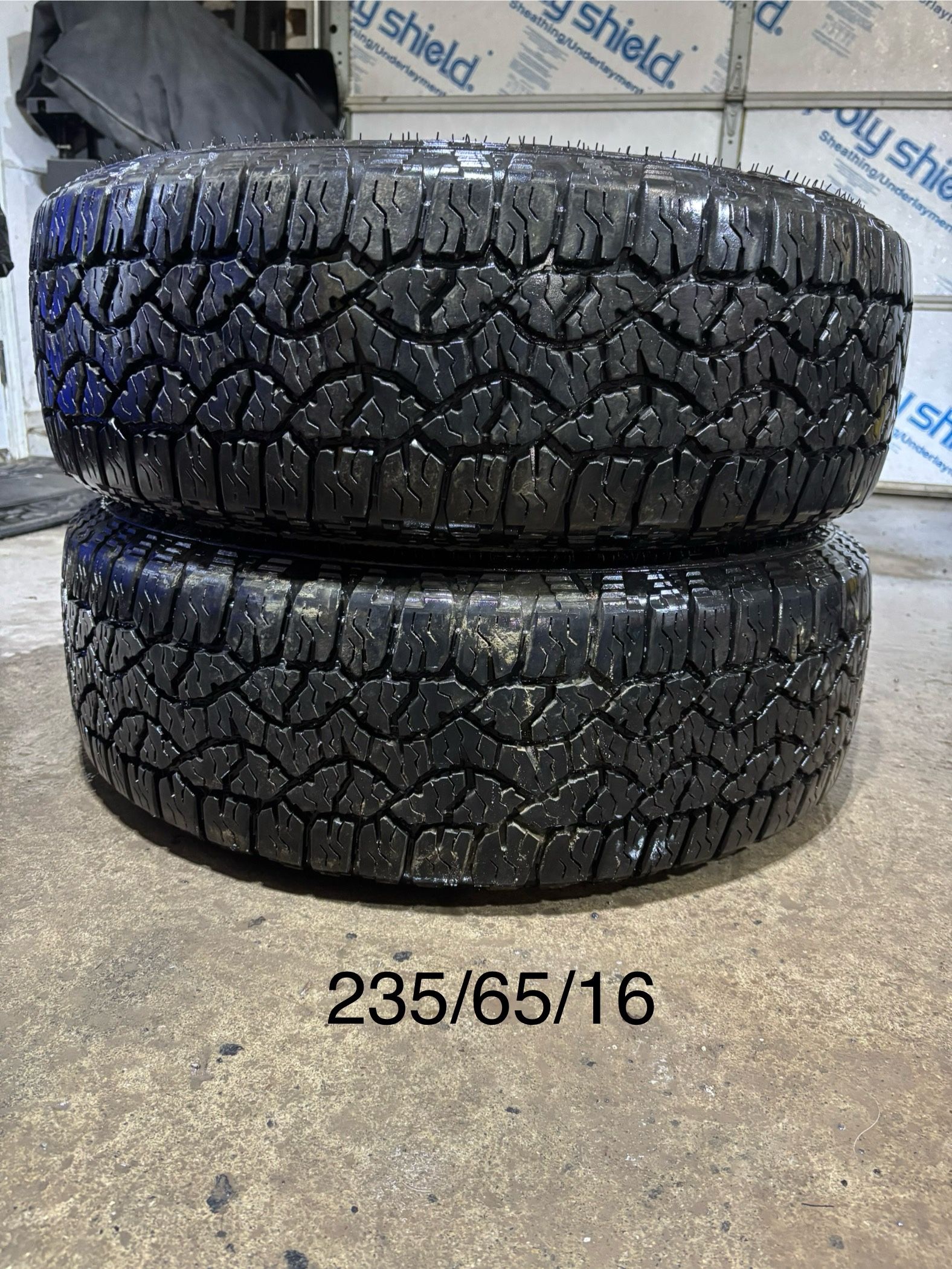 (2) - 235/65/16 Goodyear Wrangler Workhorse AT Tires
