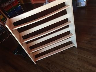 Movie shelf organizer