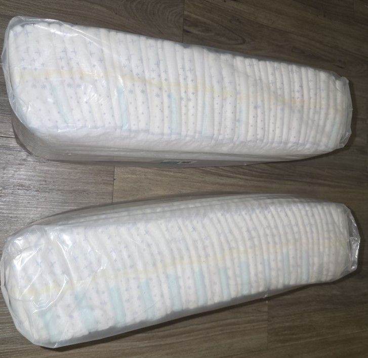 NEW PAMPERS, SIZE ONE.