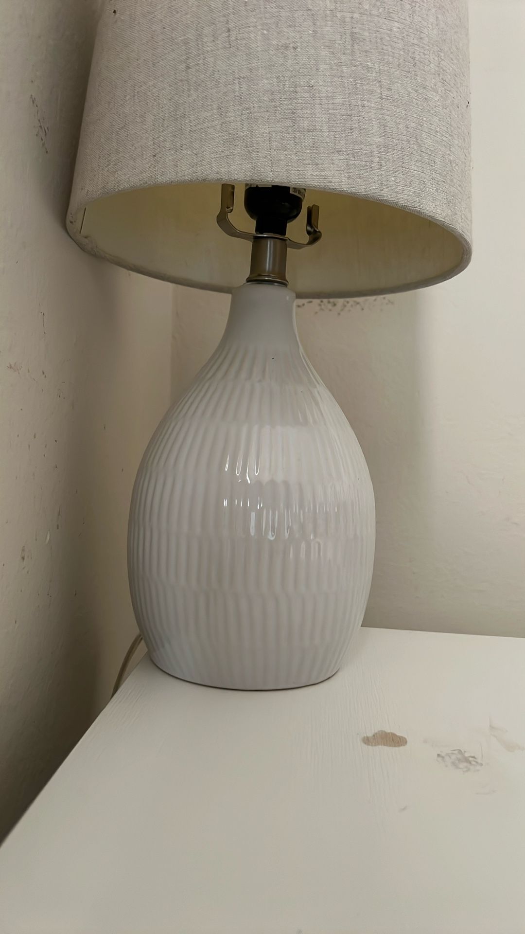 Dresser and lamp together