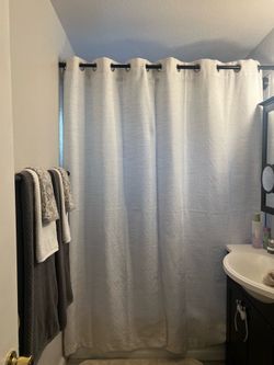 Shower curtain and rod