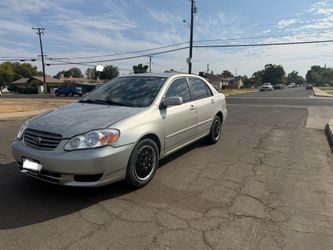 Toyota Corolla 2004 título limpio