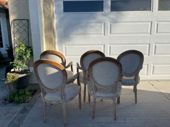 Free Restoration Hardware Louis XVI medallion armchairs.