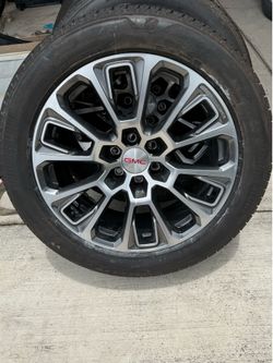 22in GMC Denali wheels/tires. Tires are Bridgestone 275/55/22 and are 99%.