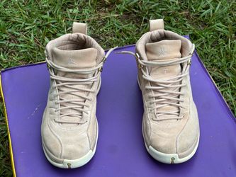 Size 8  Nike Air Jordan 12 Retro Vachetta Tan Women's shoes featuring a beige suede upper and gold hardware.