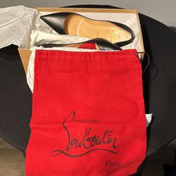 Christian Louboutin “Red Bottoms”
