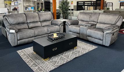 Grey sofa and love seat manual recliner set