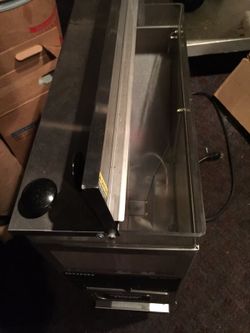 This is a machine that grinds coffee beans