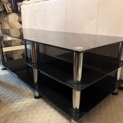 Black Glass & Chrome TV Stand – Modern & Sturdy