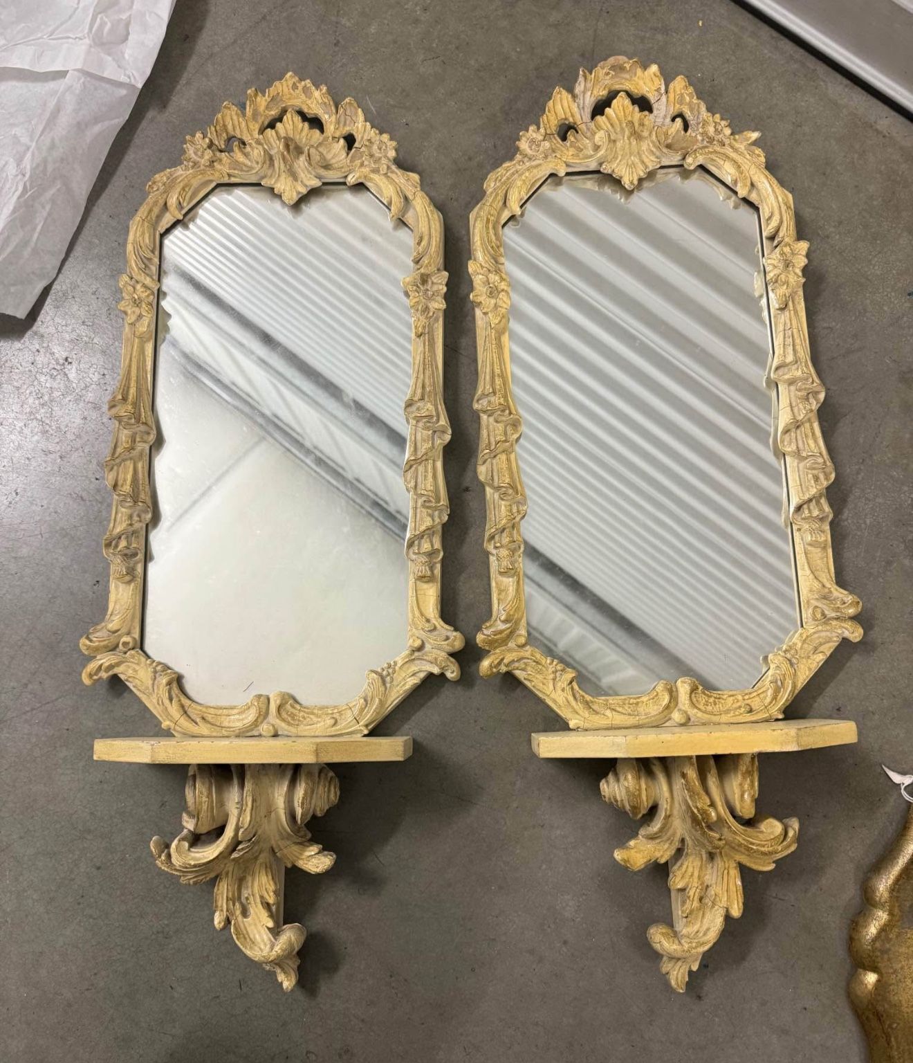 pair of vintage Rococo revival style mirrors with shelves.