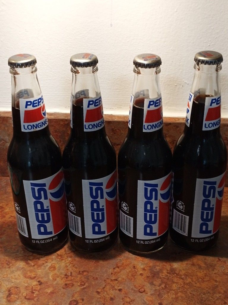 Vintage Richard Petty Pepsi Long-Neck Bottles — 4 Full, Unopened, Label Intact
