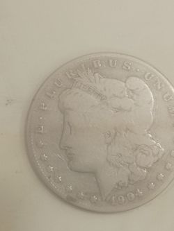 1904 a Morgan silver dollar