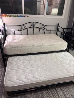FREE twin day bed with trundle and mattresses