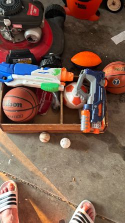 Basketballs baseballs super soakers  football soccer ball lot