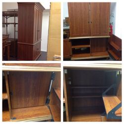 Cherry armoire with shelves and a double door concealing a further storage space