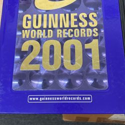 Two Guinness Book Of Records 