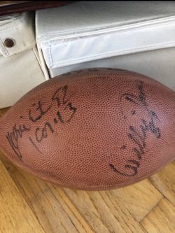 Reggie white and Willie Davis signed football