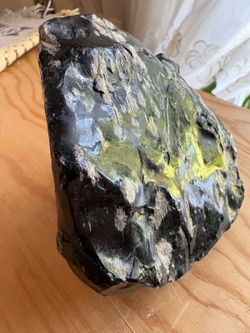 Paperweight rock.  Slag or maybe Obsidian