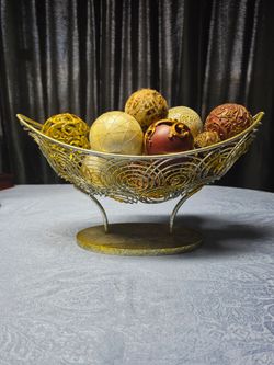 Gold metal basket with unique globes