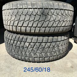 (2) - 245/60/18 Bridgestone Blizzak DM-V2 Tires