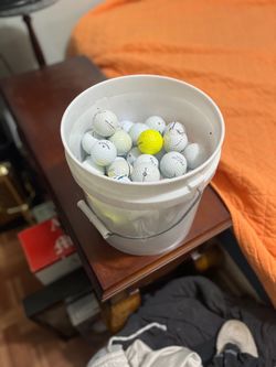 Small bucket of golf balls