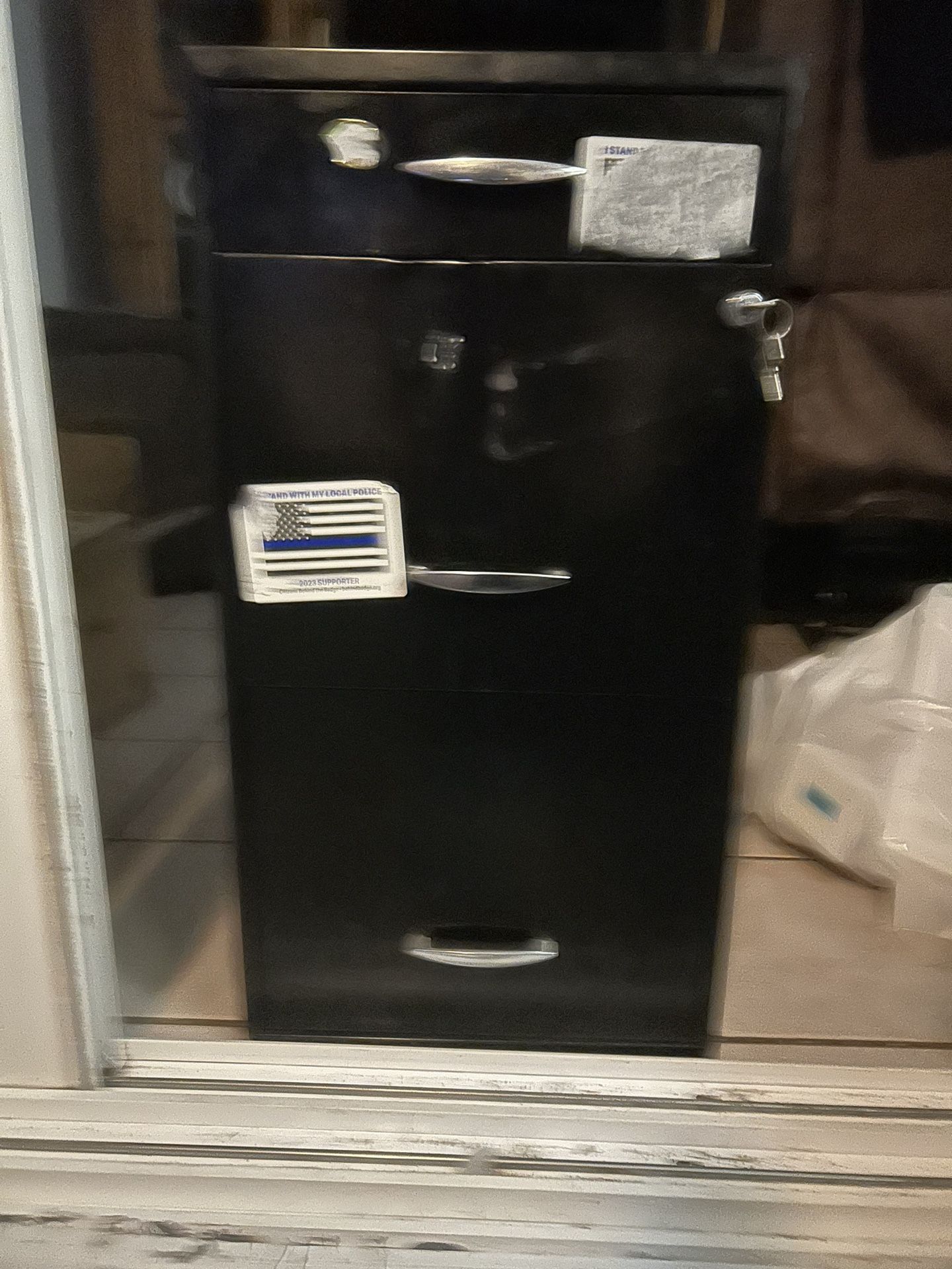 Two door filing cabinet with keys and lock