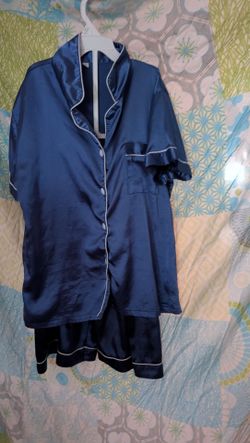 Matching satin pajama-style set in a rich royal blue with white piping