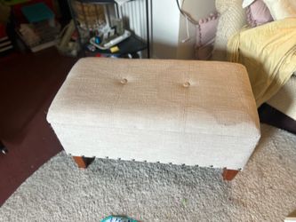 Beige storage ottoman