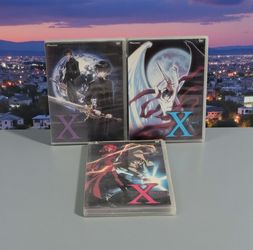 (Lot Of 3) "X" - Volumes 2/5/7: Two/Five/Seven (DVD, 2002) Japanese Anime Series. Good Condition. These are vintage anime DVDs of the series "X" based