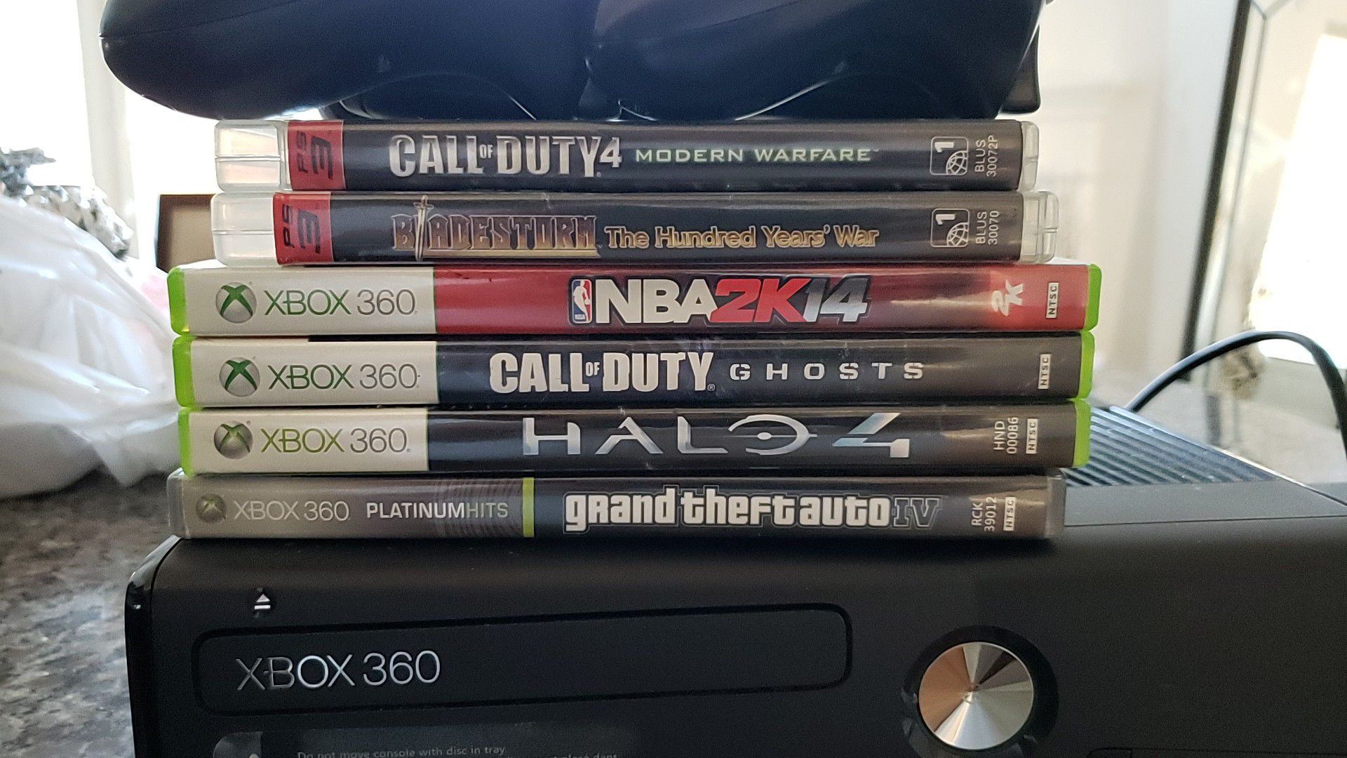 X Box 360 with 6 games and 2 wireless controllers