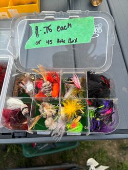Assorted high-quality hand, tied flies boxes with flies