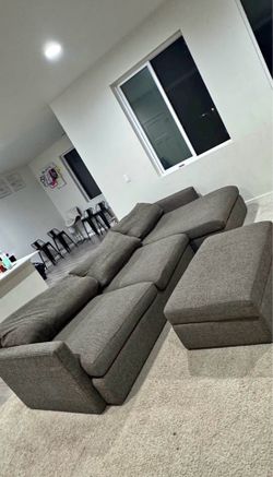 Crate and Barrel Sectional couch and ottoman