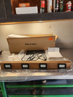 4-light wooden linear LED vanity or wall/ceiling fixture