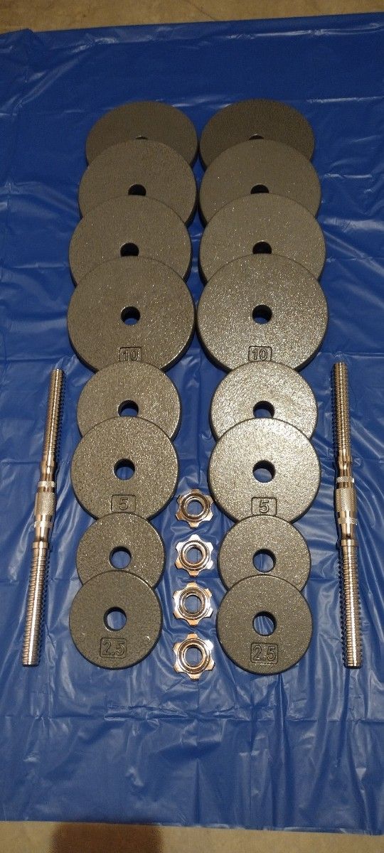 CAST IRON ADJUSTABLE DUMBBELLS SET.