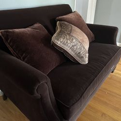 crate and barrel suede loveseat in maroon 