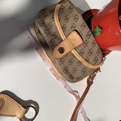 Authentic Dooney And Bourke Wristlet With A Key Chain To Match