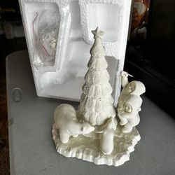 Snow babies “Lift Me Higher I Can’t Reach”