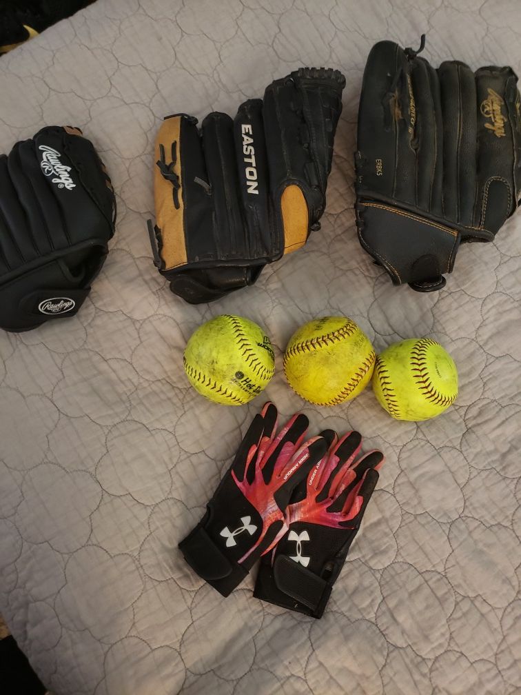3 Rawlings mitts, 3 softballs & Under Armour (S) Leather gloves