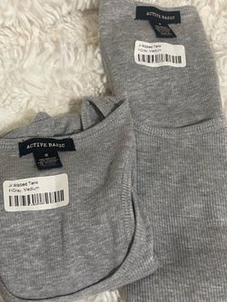 2 gray men’s muscle shirts medium