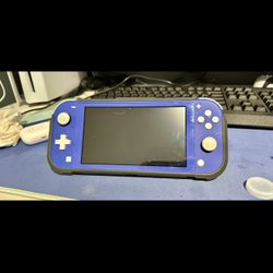 Nintendo Switch Lite including games and charger
