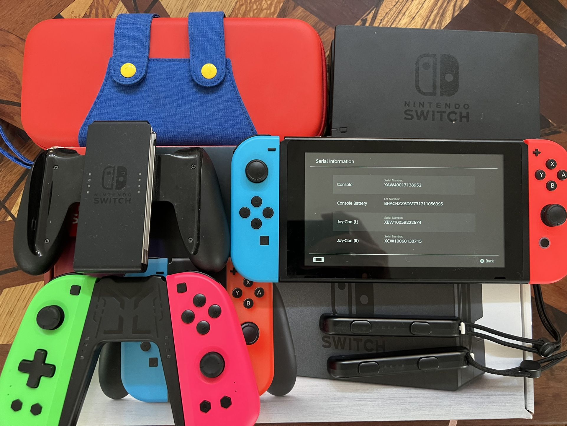 Nintendo Switch (with box) + extra Joycon & case