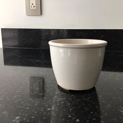 small white ceramic planter pot with drainage hole 