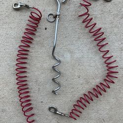 Dog Ground Screw Tie Down And Curly Leashes. 