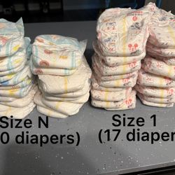 20 Newborn Diapers And 17 Size 1 Diapers 