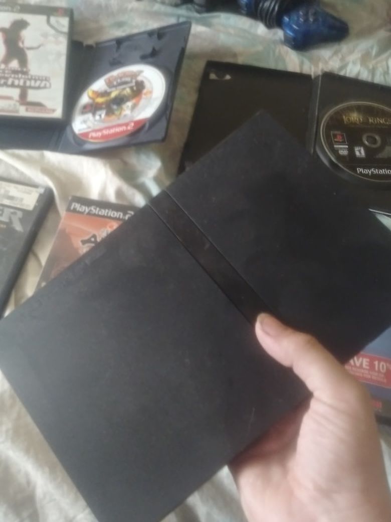 Ps2 With 5 Remotes And Games